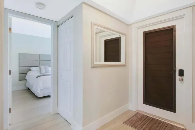 a view of a bedroom from the hallway