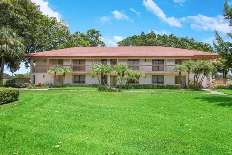 a view of a house with a garden