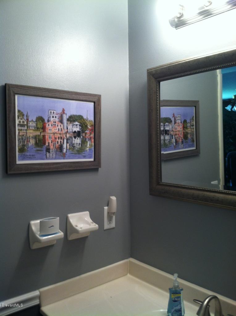 1294 Ne Port Palm Bay, FL 32905 - Photo 23 of 26 GUEST BATH 7