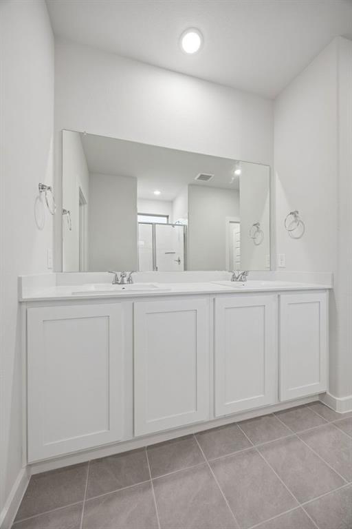 316 Millwood Road Lavon, TX 75166 - Photo 22 of 37 Primary Bathroom in the Oak II home plan by Trophy Signature Homes – REPRESENTATIVE PHOTO