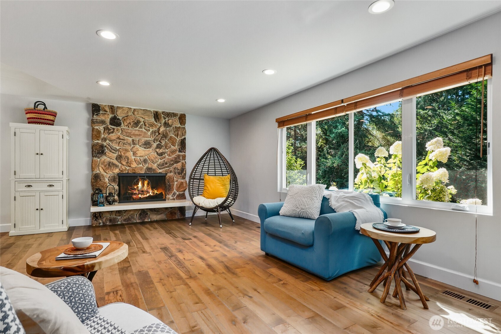 10414 Southwest 110th Street Vashon, WA 98070 - Photo 7 of 37 a living room with furniture and a large window