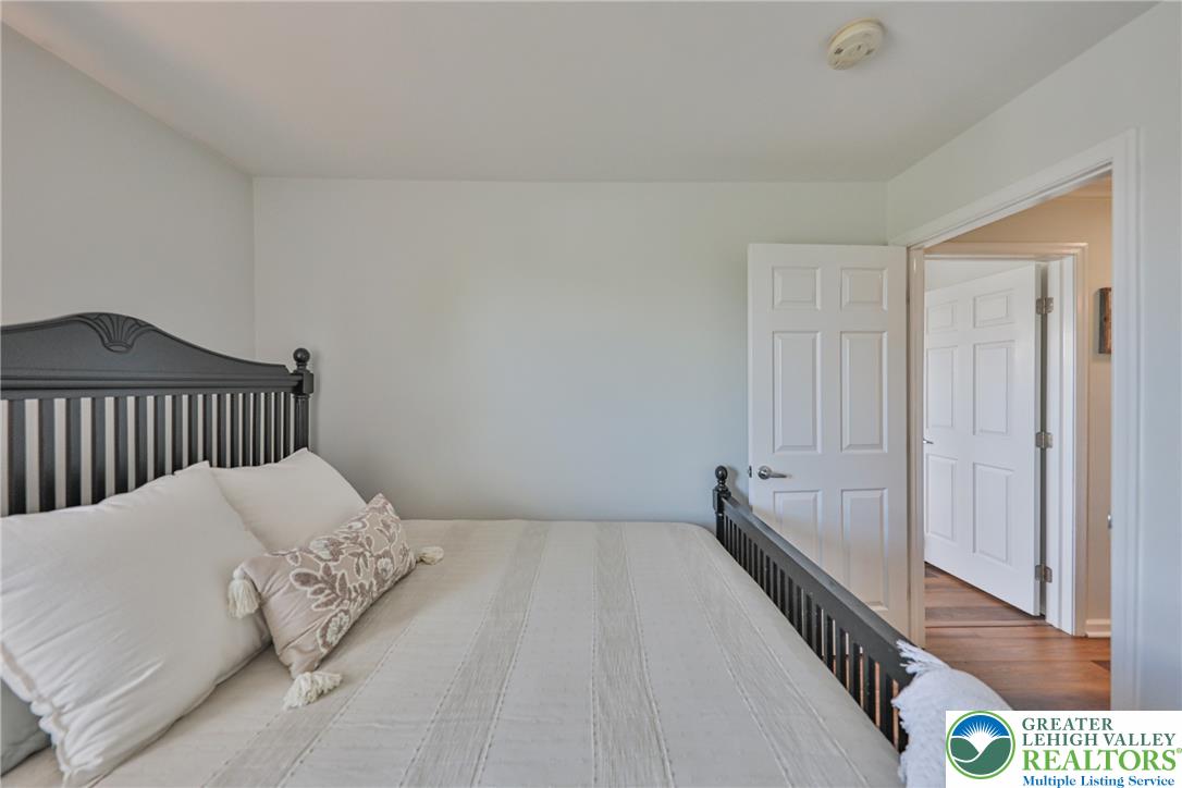 163 Muirfield Way Easton, PA 18042 - Photo 29 of 48 a bedroom with a bed and a window