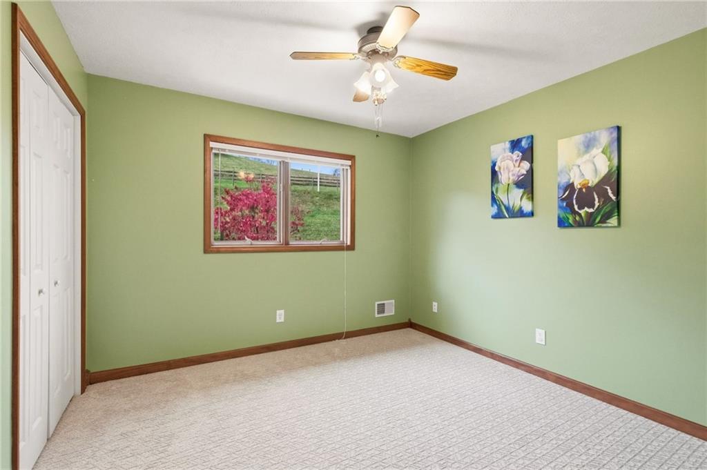 327 Sugar Run Road Waynesburg, PA 15370 - Photo 19 of 29 an empty room with painting on the wall