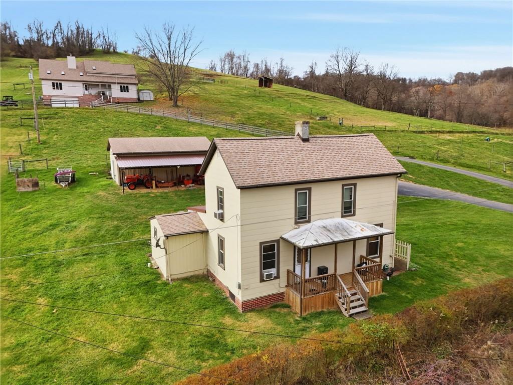 327 Sugar Run Road Waynesburg, PA 15370 - Photo 22 of 29 an aerial view of a house with garden