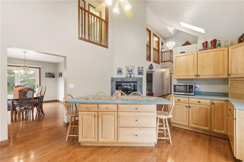 327 Sugar Run Road Waynesburg, PA 15370 - Photo 7 of 29 a kitchen with cabinets and wooden floor