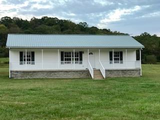 4247 Fairview Road Columbia, TN 38401 - Photo 1 of 6 a view of a house with a backyard