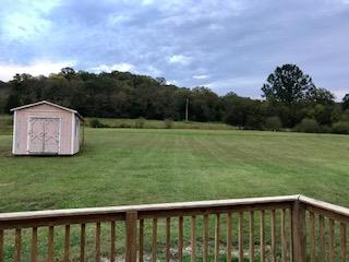 4247 Fairview Road Columbia, TN 38401 - Photo 2 of 6 a view of a lush green field