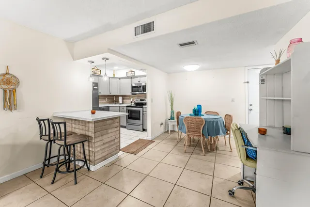 a view of a dining room with furniture