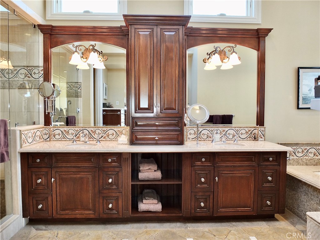 1700 Bluff Place, Unit 1 Long Beach, CA 90802 - Photo 19 of 45 a view of kitchen with granite countertop cabinets and a stove