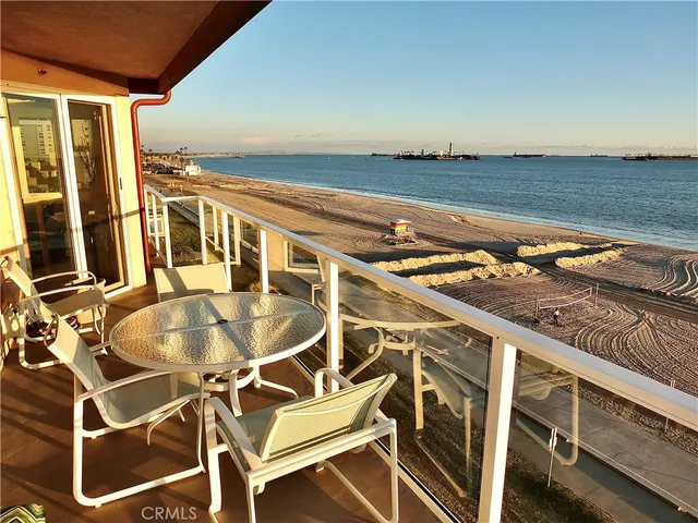 a terrace with a table and chairs