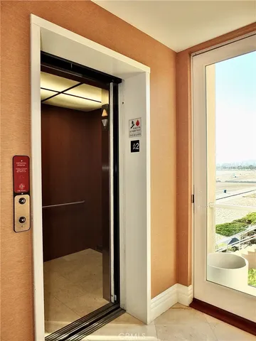 a view of a swimming pool with side of bathroom
