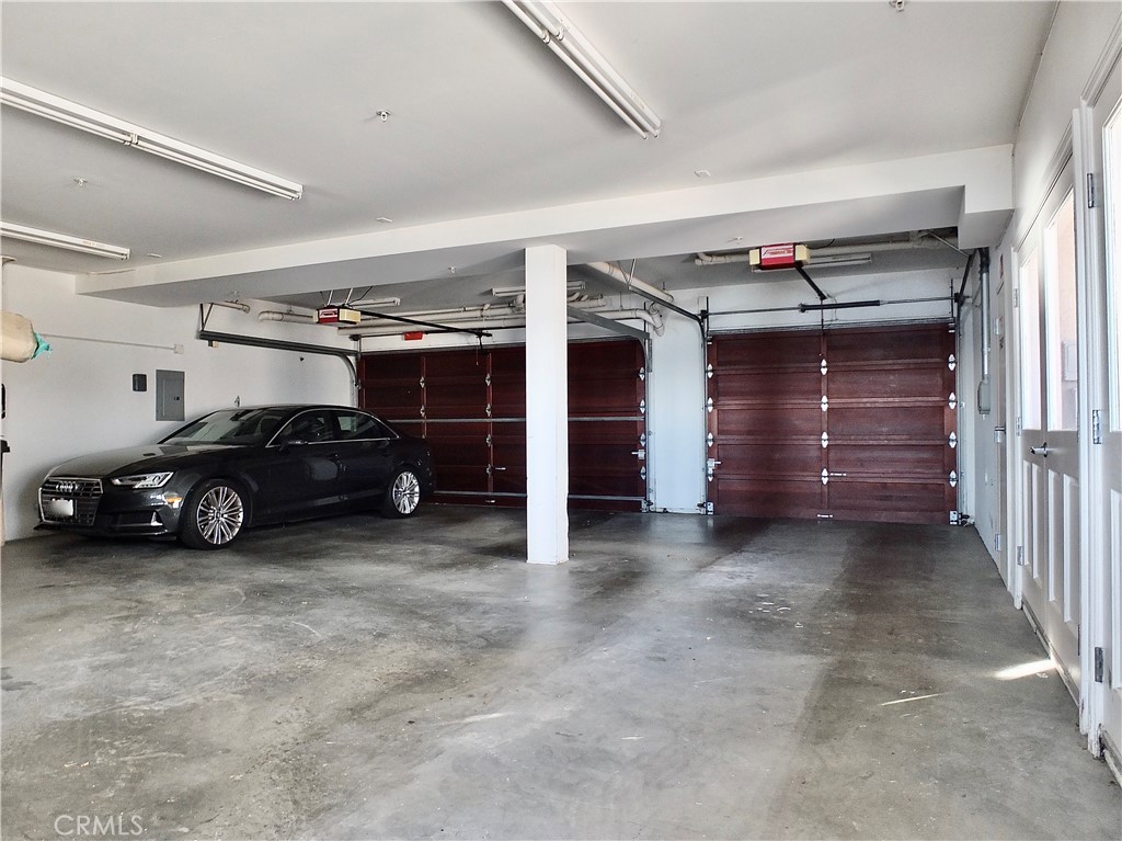 1700 Bluff Place, Unit 1 Long Beach, CA 90802 - Photo 38 of 45 a view of parking garage with cars