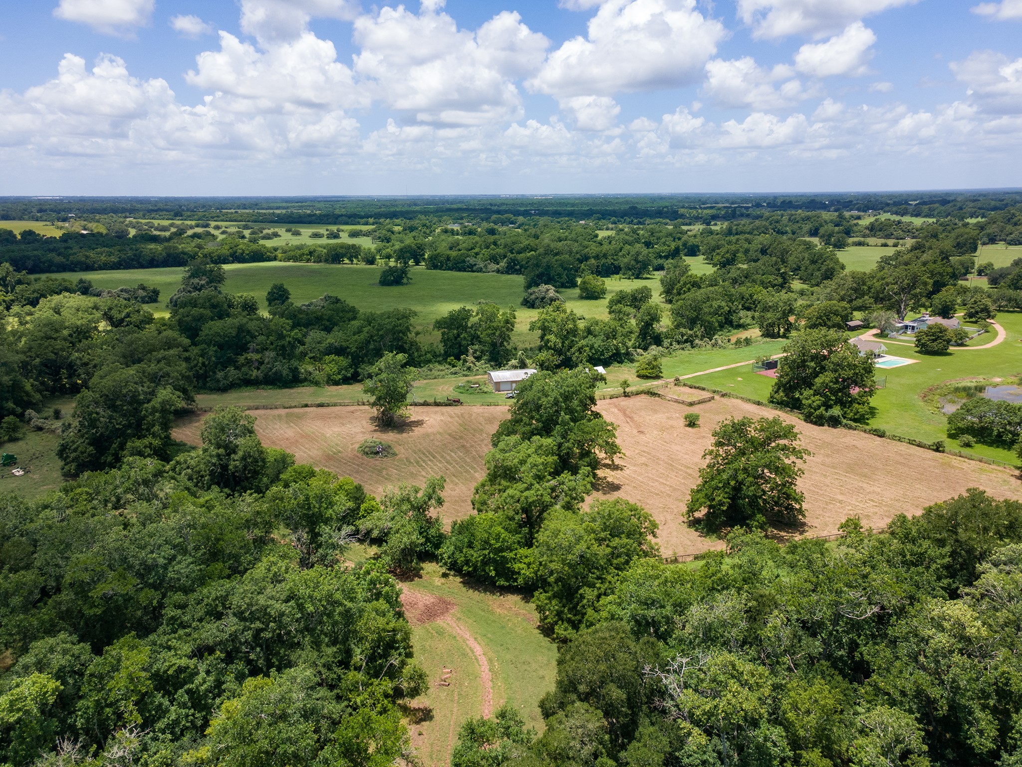 2908 Robichaux Road Pattison, TX 77423 - Photo 13 of 50 a view of a lake with houses in back