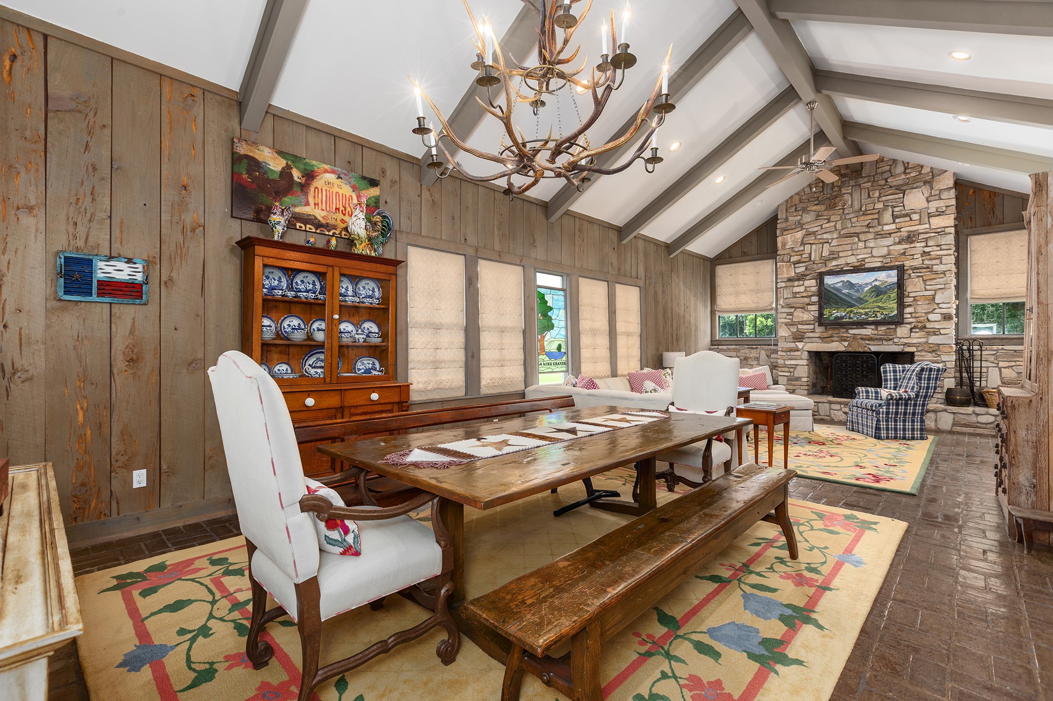 2908 Robichaux Road Pattison, TX 77423 - Photo 21 of 50 a dining room with furniture a rug and a chandelier