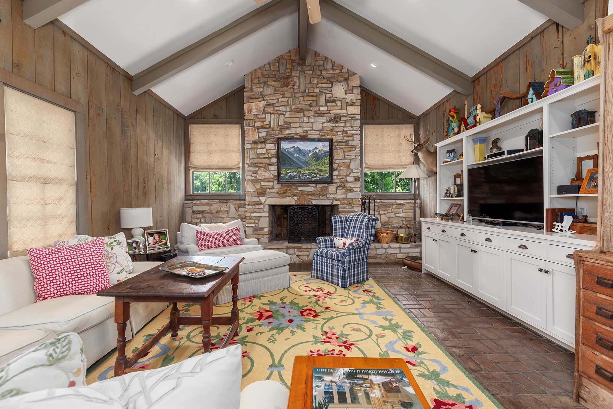 2908 Robichaux Road Pattison, TX 77423 - Photo 23 of 50 a living room with furniture a flat screen tv and a fireplace
