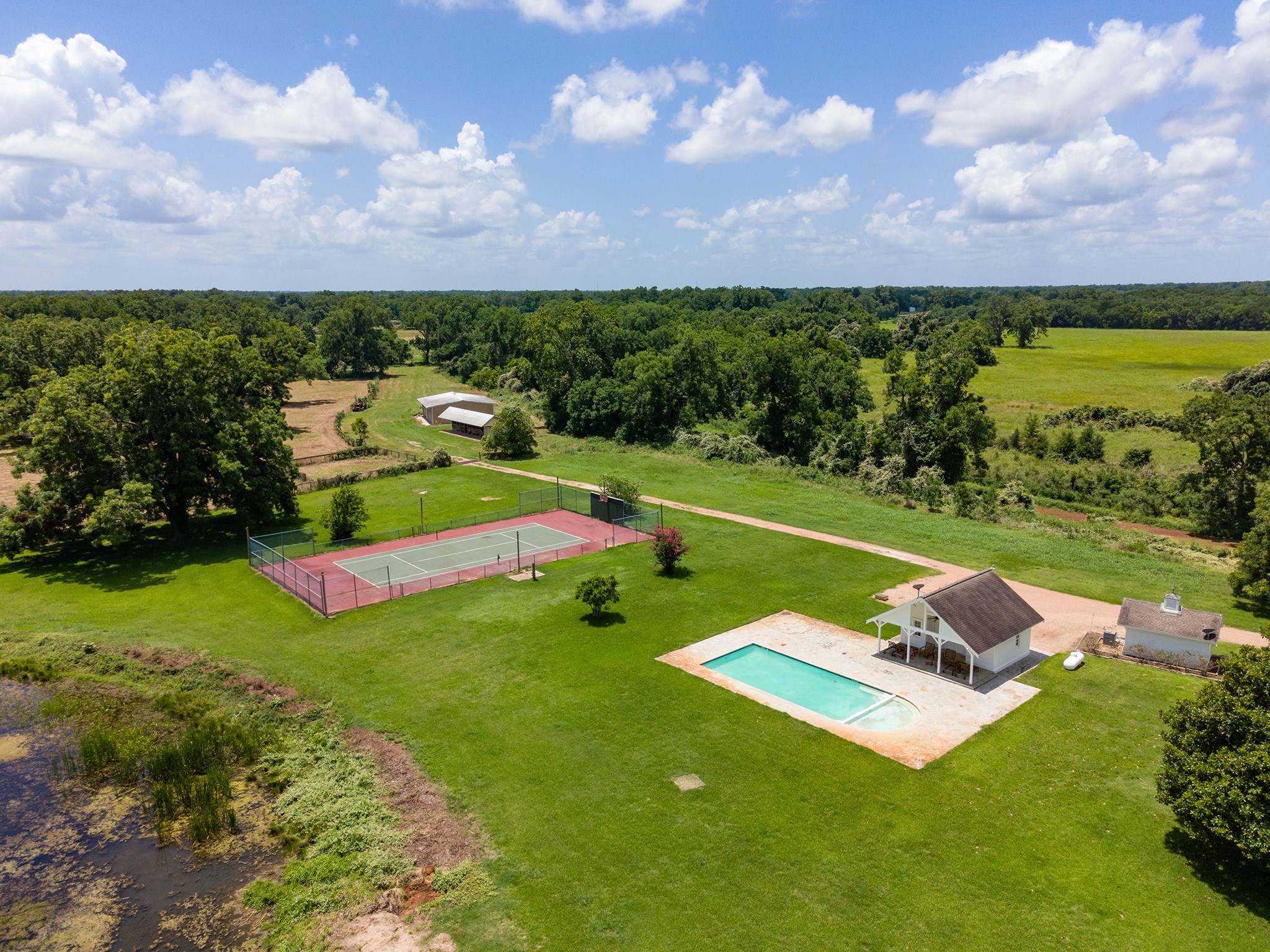 2908 Robichaux Road Pattison, TX 77423 - Photo 4 of 50 a view of a golf course with a garden