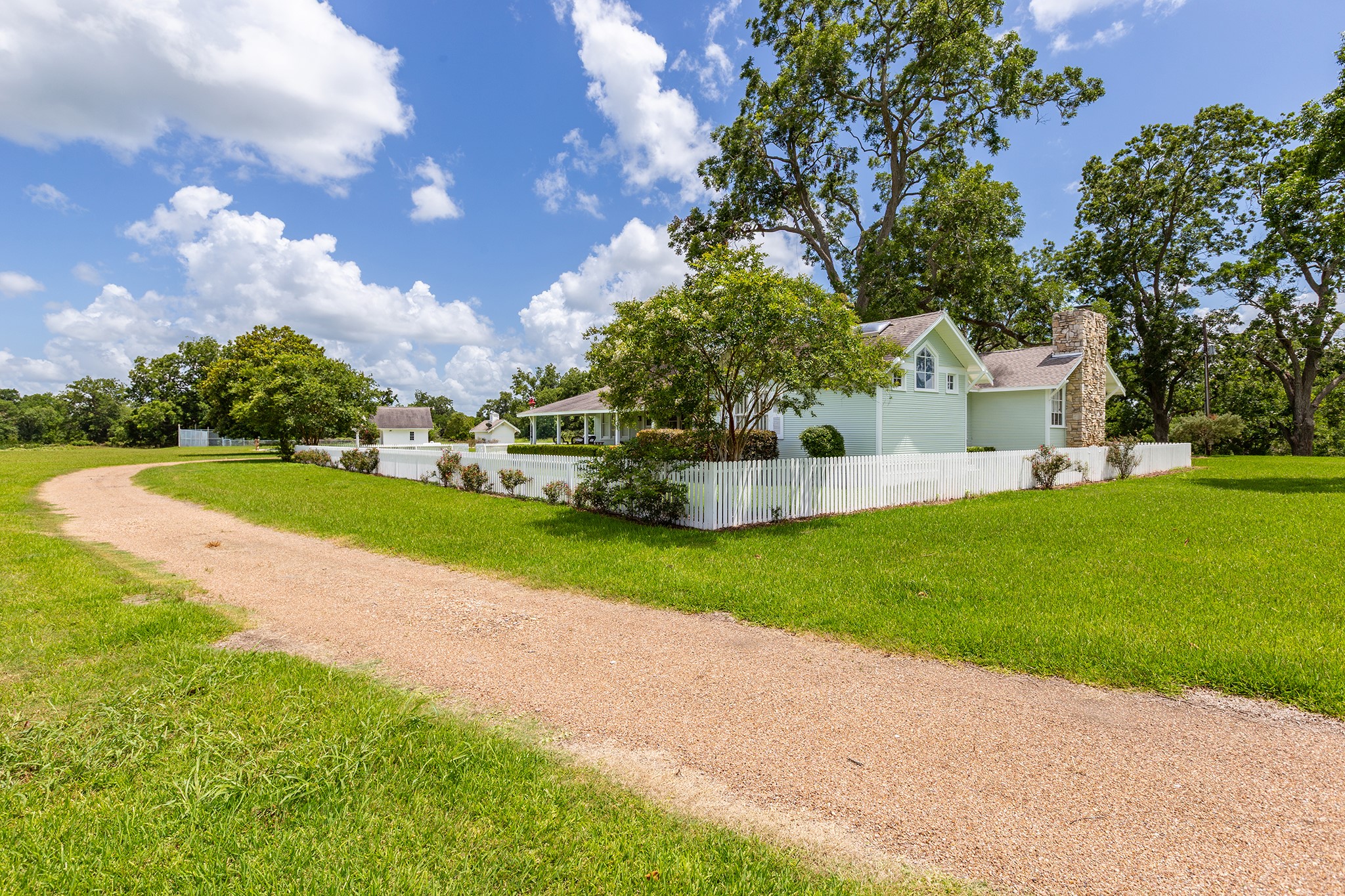 2908 Robichaux Road Pattison, TX 77423 - Photo 41 of 50 a view of a house with a big yard and large trees