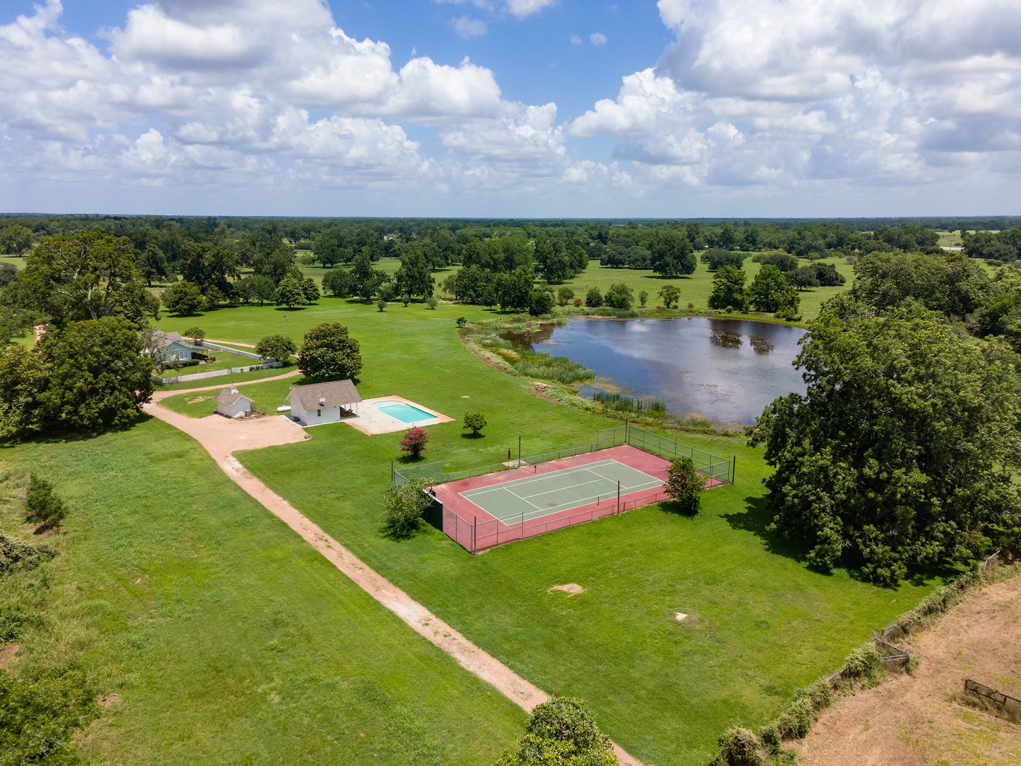 2908 Robichaux Road Pattison, TX 77423 - Photo 5 of 50 a view of a lake with a yard