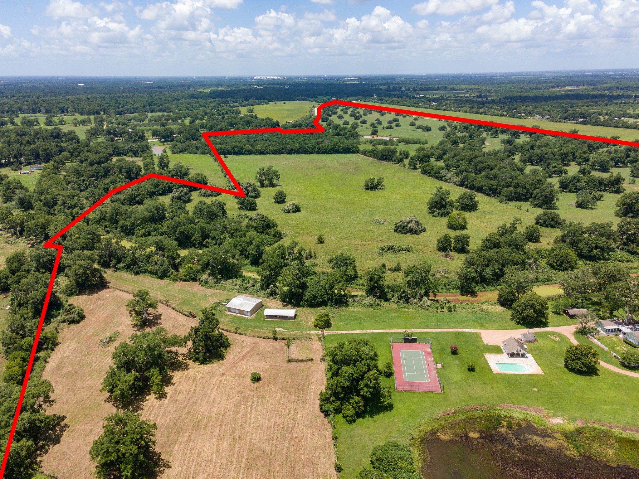 2908 Robichaux Road Pattison, TX 77423 - Photo 9 of 50 view of outdoor space swimming pool and green space