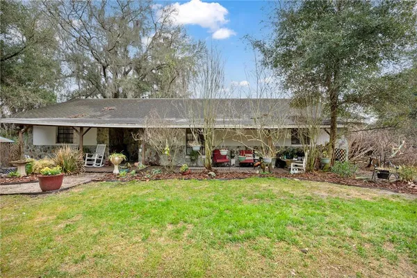 a view of a house with sitting area and sitting area