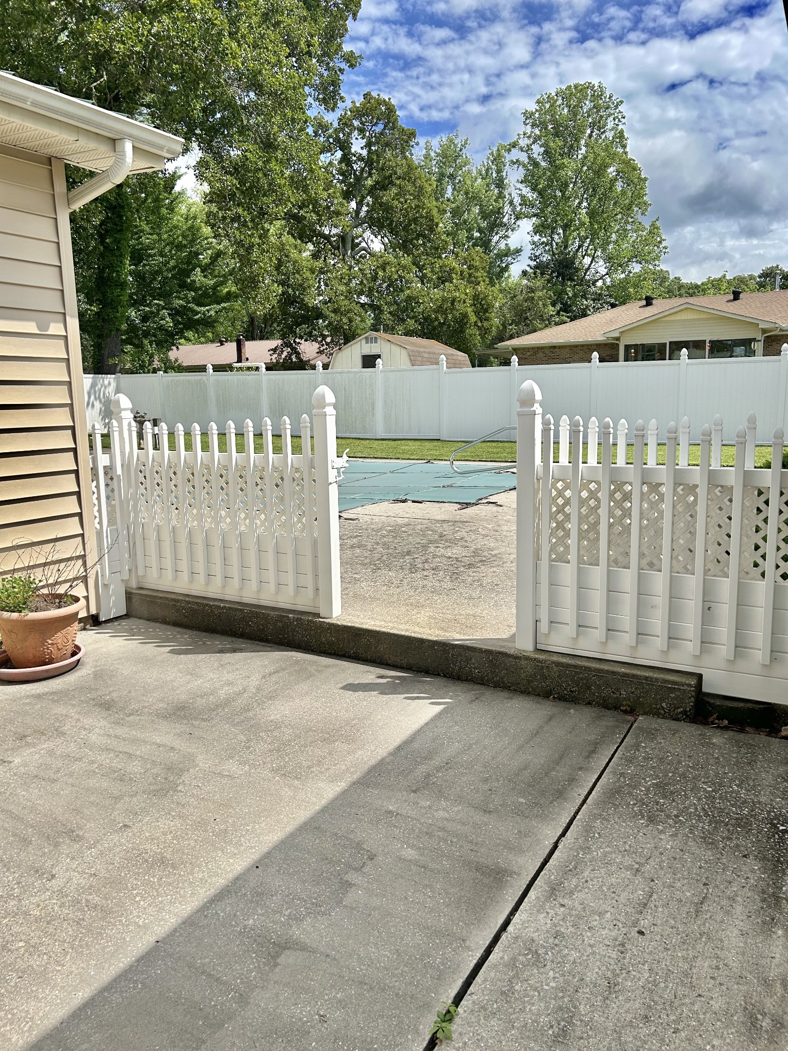 1306 McMahan Street Manchester, TN 37355 - Photo 41 of 48 a view of a street sign under a large tree