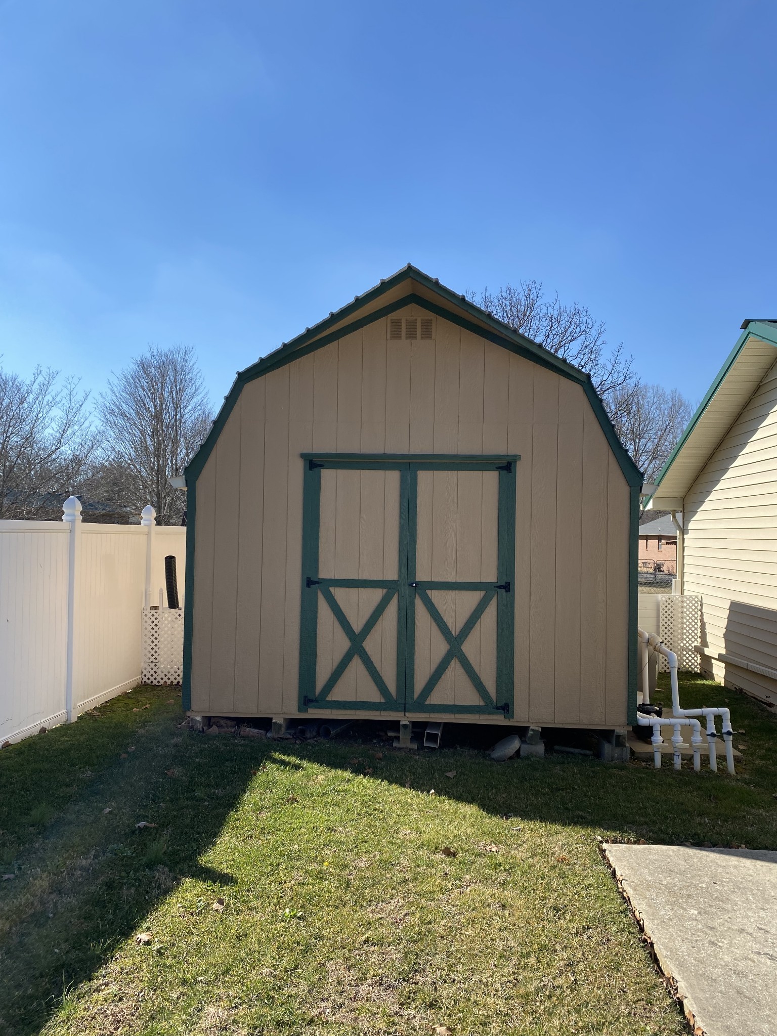 1306 McMahan Street Manchester, TN 37355 - Photo 45 of 48 a front view of a house with garden