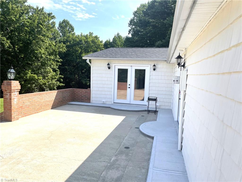 499 Mount Herman Church Road Mount Airy, NC 27030 - Photo 29 of 50 Back Patio W/ Kitchen Entry