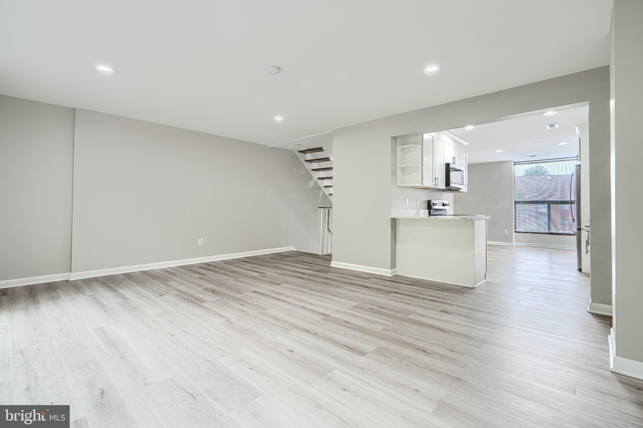 5520 Vantage Point Road Columbia, MD 21044 - Photo 11 of 28 a view of empty room with wooden floor