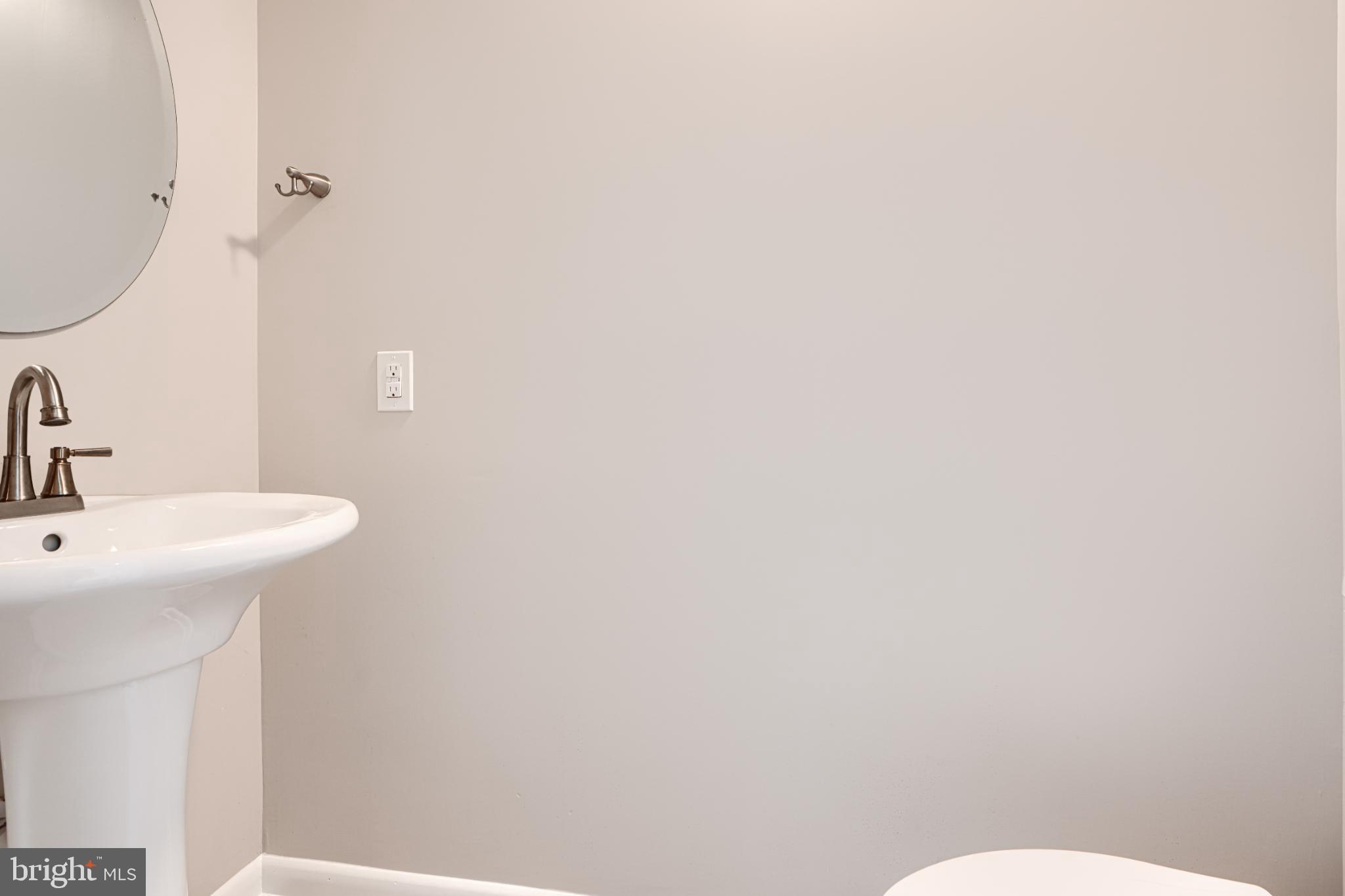 5520 Vantage Point Road Columbia, MD 21044 - Photo 13 of 28 a bathroom with a sink a toilet