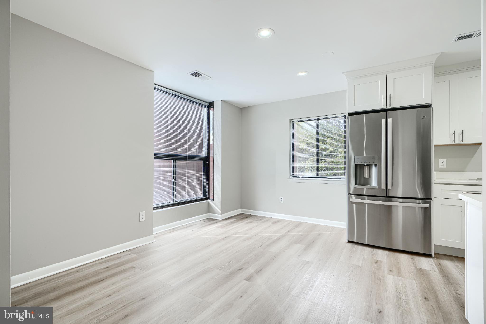 5520 Vantage Point Road Columbia, MD 21044 - Photo 14 of 28 a kitchen with a refrigerator freezer and a dishwasher