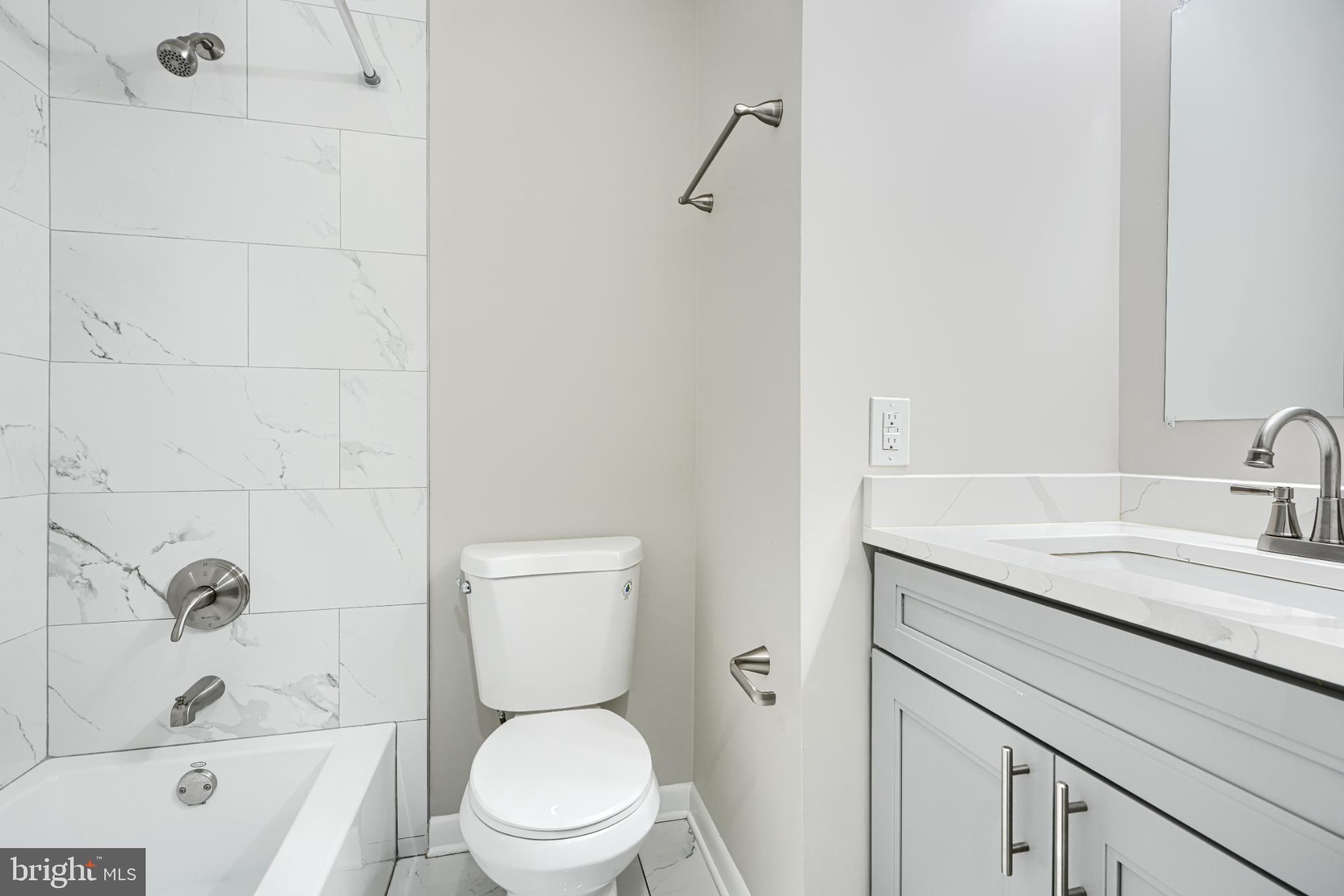 5520 Vantage Point Road Columbia, MD 21044 - Photo 26 of 28 a bathroom with a sink a toilet and shower