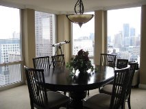 111 East Chestnut Street, Unit 45K Chicago, IL 60611 - Photo 11 of 15 a view of a dining room with furniture window and outside view