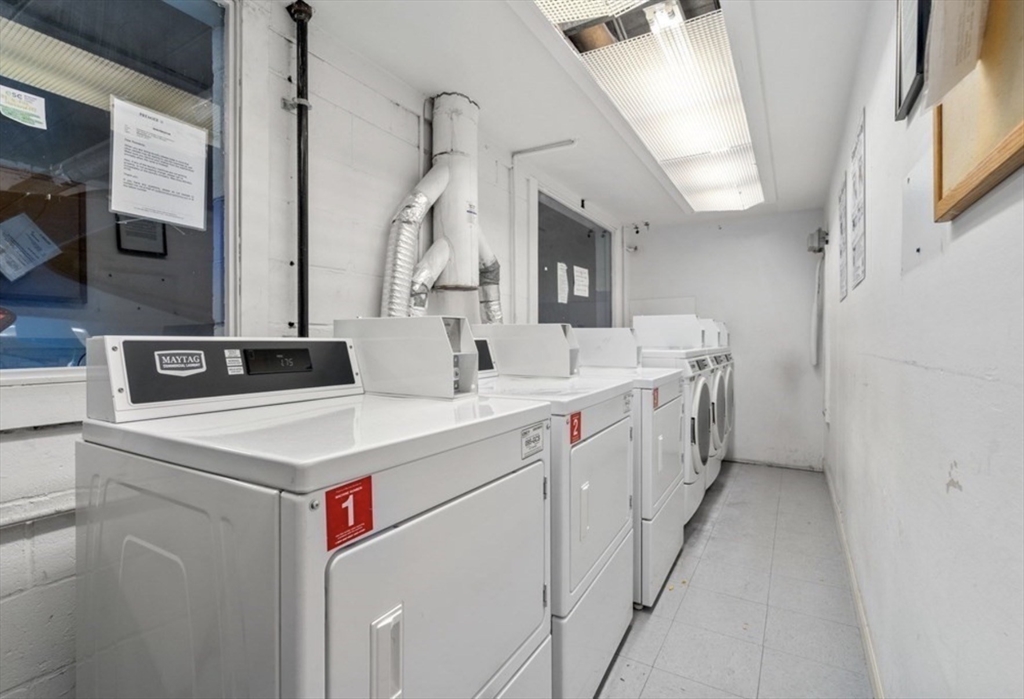 20 Stearns Road, Unit 45 Brookline, MA 02446 - Photo 18 of 22 a utility room with dryer and washer