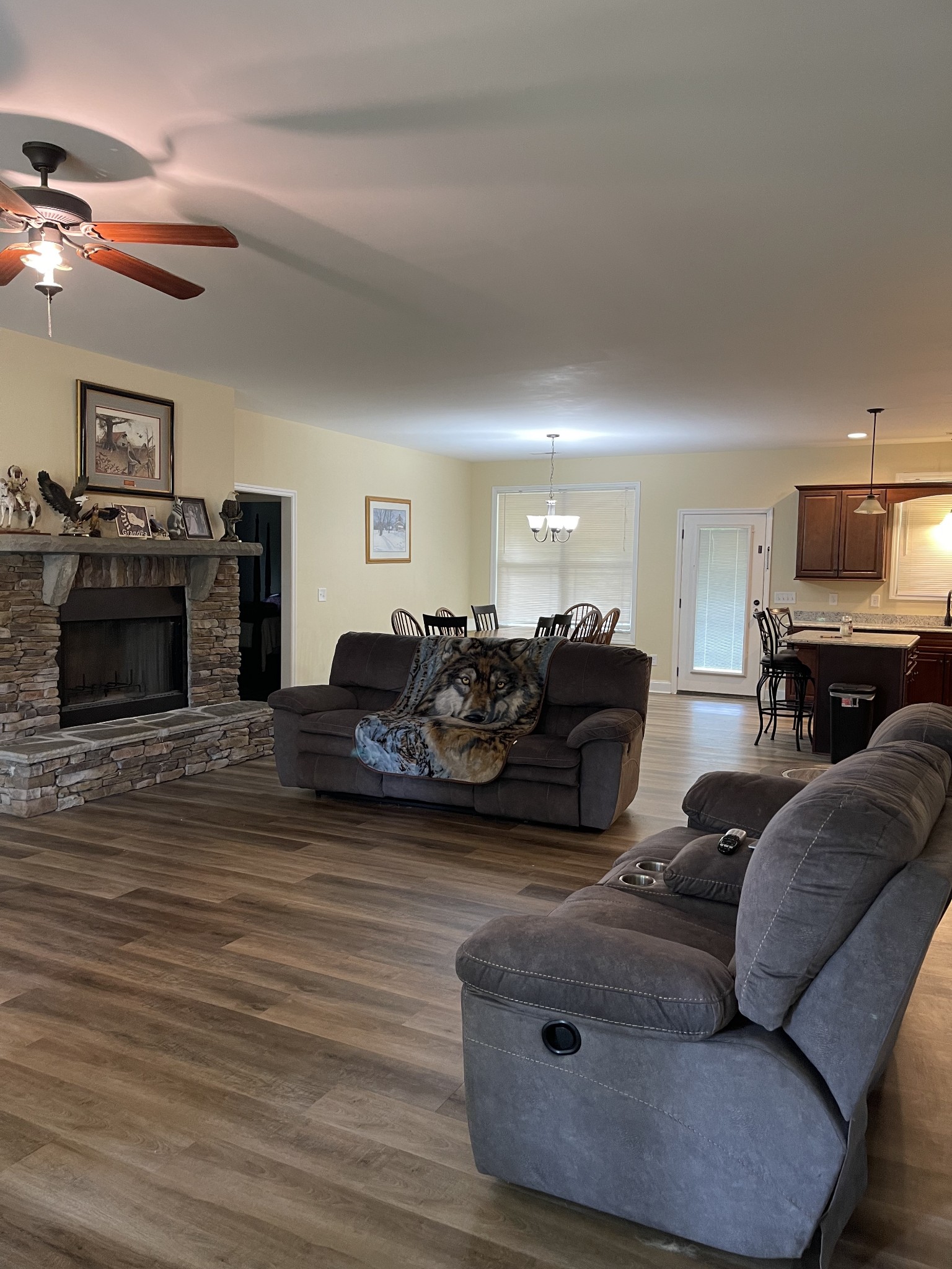 511 Franklin Road Gallatin, TN 37066 - Photo 11 of 47 a living room with furniture a fireplace and a flat screen tv