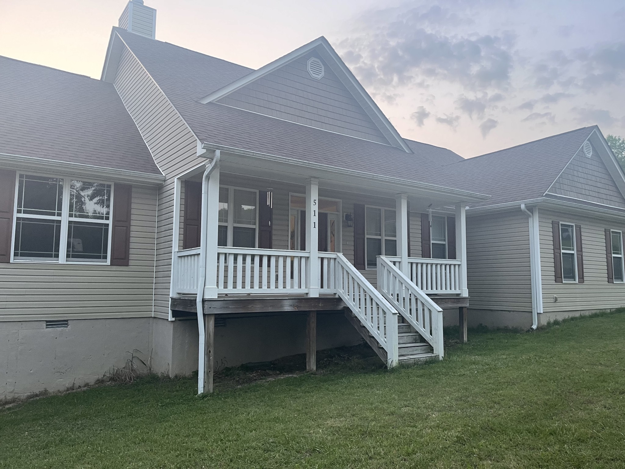 511 Franklin Road Gallatin, TN 37066 - Photo 2 of 47 a view of a house with a deck and a yard