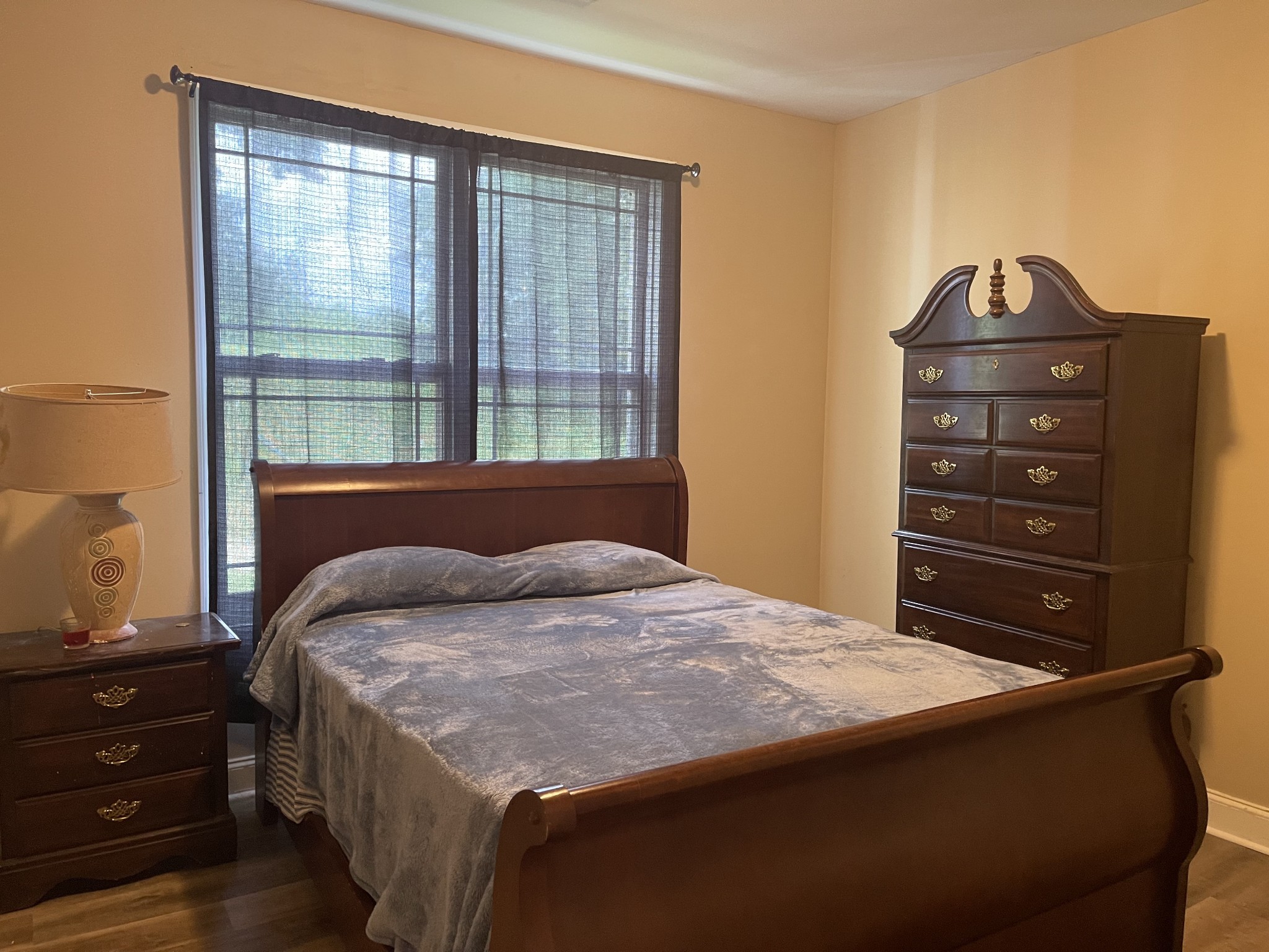 511 Franklin Road Gallatin, TN 37066 - Photo 25 of 47 a bedroom with a bed and a window
