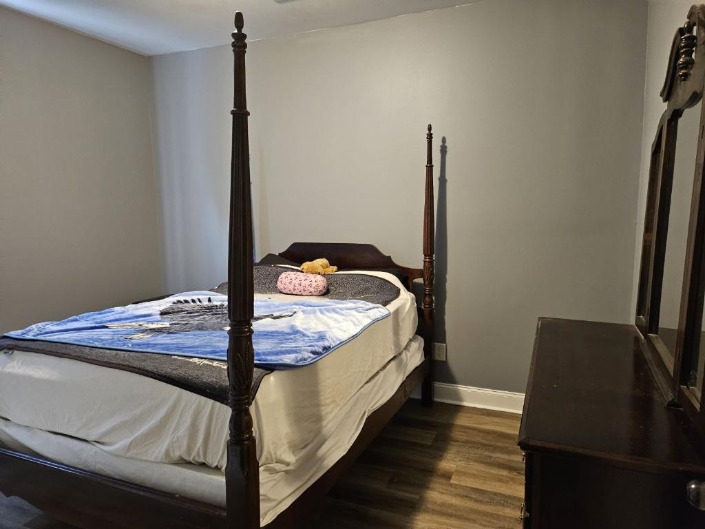 511 Franklin Road Gallatin, TN 37066 - Photo 26 of 47 a bed sitting in a bedroom next to a window