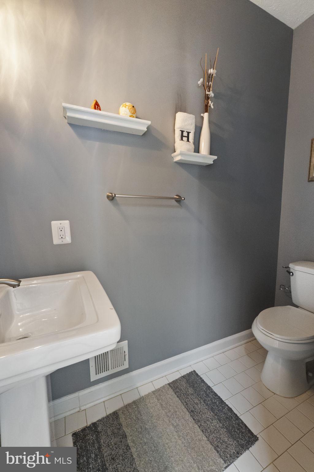3207 Breckenridge Way Riva, MD 21140 - Photo 16 of 51 a bathroom with a sink and a toilet