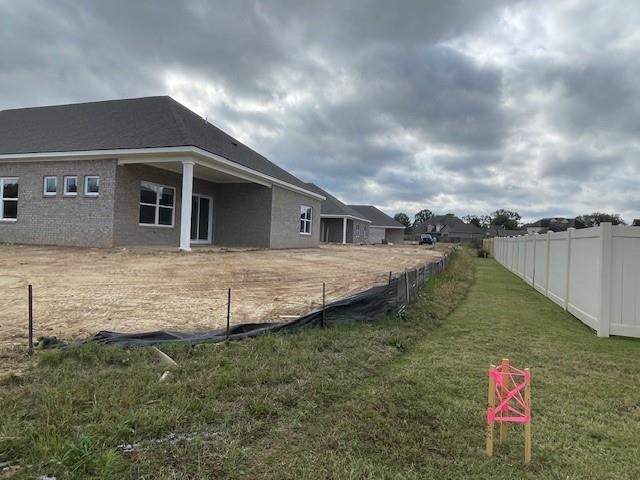 4225 Sandy Hollow Lane Millington, TN 38053 - Photo 13 of 28 View of home's exterior with a yard