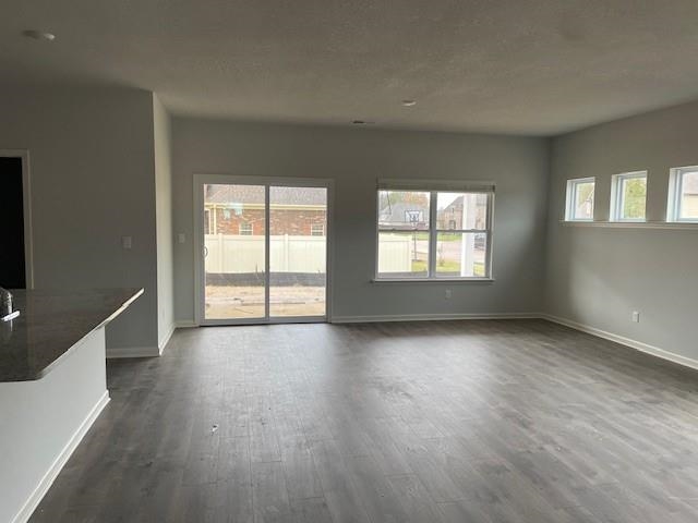 4225 Sandy Hollow Lane Millington, TN 38053 - Photo 3 of 28 Unfurnished living room with dark hardwood / wood-style floors and plenty of natural light