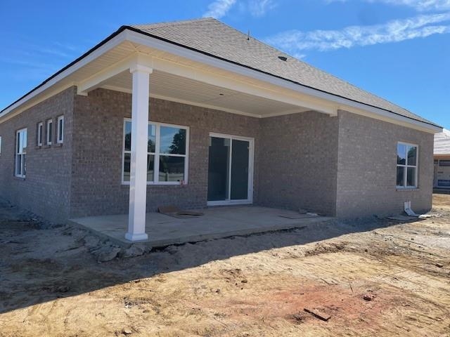 4225 Sandy Hollow Lane Millington, TN 38053 - Photo 9 of 28 Rear view of house with a patio area