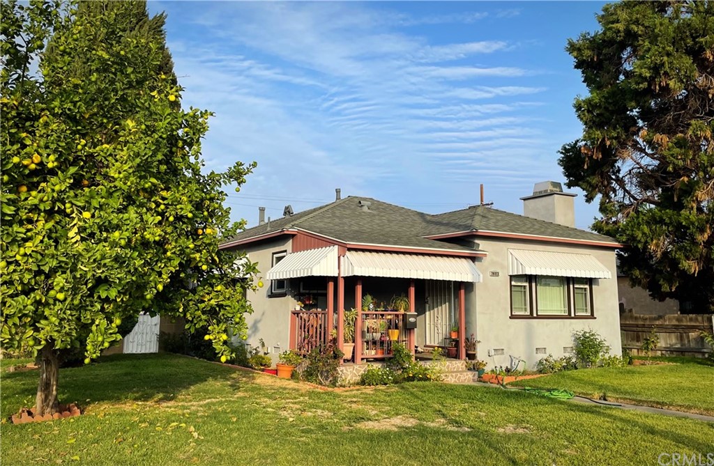 front view of a house with a yard