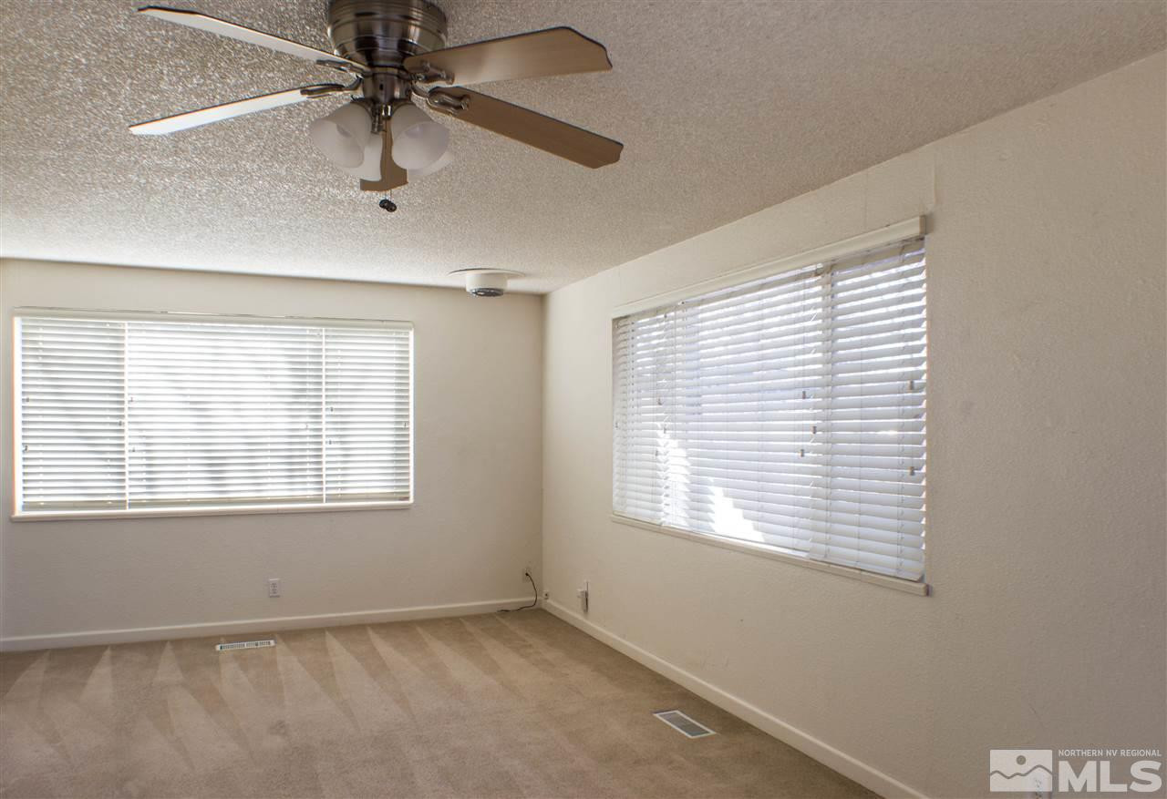 1045 Litch Court Reno, NV 89509 - Photo 9 of 18 a view of an empty room with a window