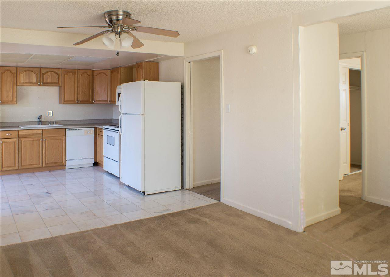 1045 Litch Court Reno, NV 89509 - Photo 10 of 18 a view of a kitchen with a sink and a refrigerator