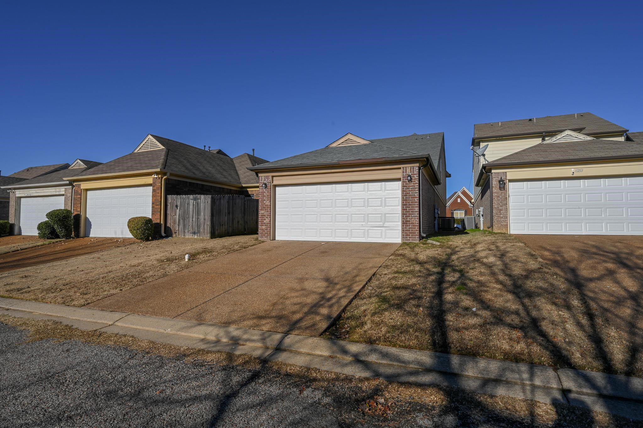 10249 Sterling Ridge Drive Cordova, TN 38018 - Photo 24 of 27 a front view of a house with a yard