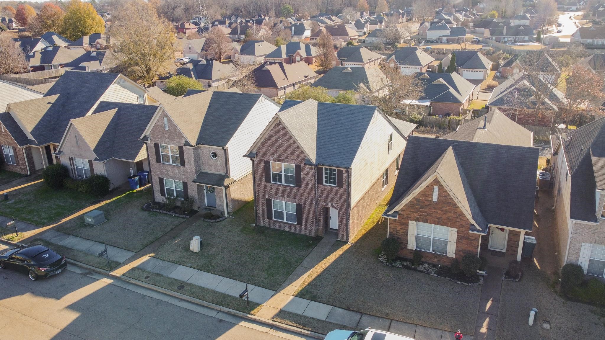 10249 Sterling Ridge Drive Cordova, TN 38018 - Photo 3 of 27 an aerial view of residential houses with yard