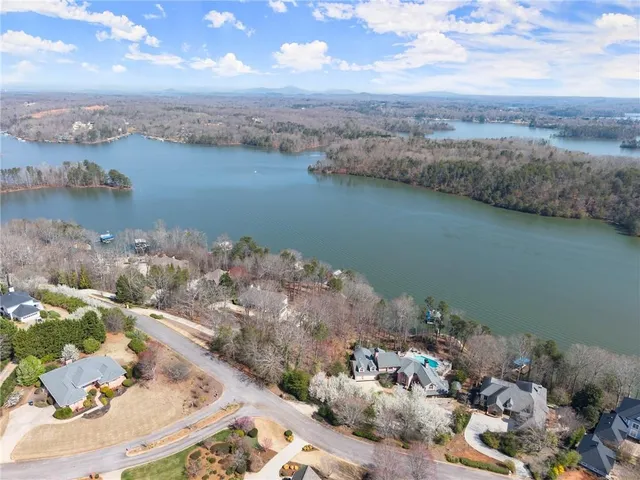 an aerial view of a houses with outdoor space