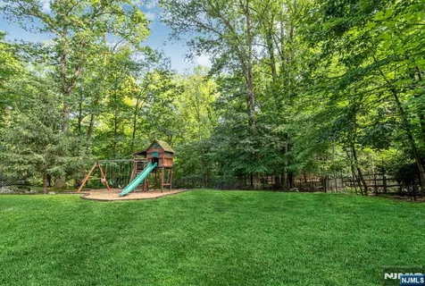 a view of a park with a slide