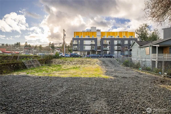 a view of a large swimming pool with a yard