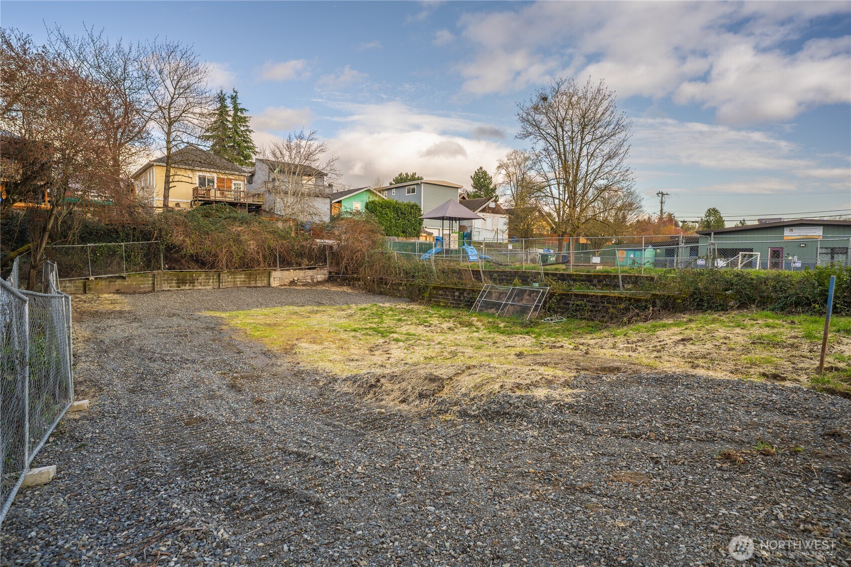 4222 37th Avenue South Seattle, WA 98118 - Photo 2 of 2 a view of a yard with a house